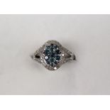 Gemporia - A 9ct white gold Tomas Rae blue and white diamond ring,