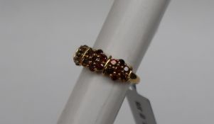 Gemporia - A 9ct gold red diamond ring,