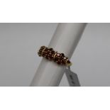 Gemporia - A 9ct gold red diamond ring,