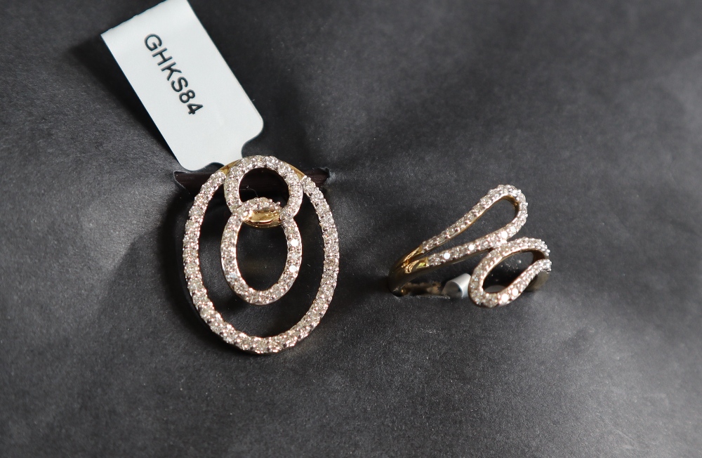 Gemporia - A 9ct gold Tomas Rae diamond pendant, set with round cut diamonds totalling 1ct,