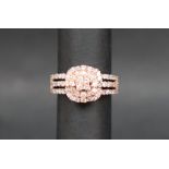 Gemporia - A 9ct rose gold Tomas Rae pink diamond ring, set with round cut diamonds totalling 1.