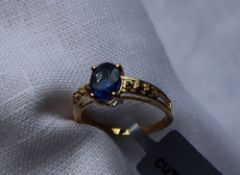 Gemporia - A 9ct gold kyanite and blue diamond ring, set with oval kyanite and blue diamond ring,