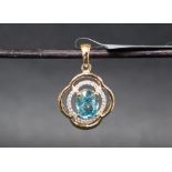 Gemporia - A 9ct gold blue and white zircon pendant,