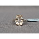 Gemporia - A 9ct gold champagne danburite and diamond ring, set with 5.