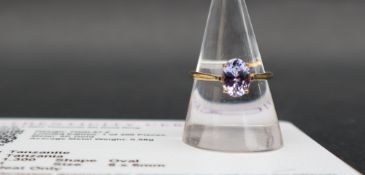 Gemporia - A 9ct gold tanzanite ring, set with oval tanzanite to a 9ct gold setting and shank,