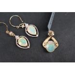 Gemporia - A 9ct gold opal pendant, set with a 1.