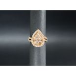 Gemporia - A 9ct Argyle diamond Tomas Rae ring, set with round cut diamonds totalling 1.