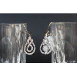 Gemporia - A pair of 9ct gold Tomas Rae diamond earrings, set with round cut diamonds totalling 1ct,