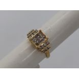Gemporia - A 9ct gold Tomas Rae diamond ring, set with round and square cut diamonds totalling 1ct,