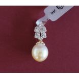 Gemporia - A 9ct gold cultured pearl and diamond pendant,