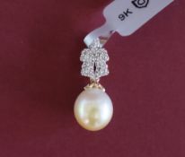 Gemporia - A 9ct gold cultured pearl and diamond pendant,