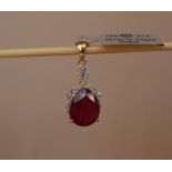 Gemporia - A 9ct gold ruby and white zircon pendant,