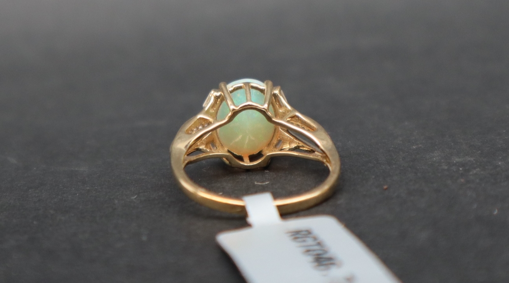 Gemporia - A 9ct gold opal and white zircon ring, - Image 4 of 5