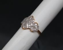 Gemporia - A 9ct gold diamond ring, set with tapered baguette and round cut diamonds,