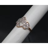 Gemporia - A 9ct gold diamond ring, set with tapered baguette and round cut diamonds,