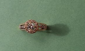 Gemporia - A 9ct gold diamond ring, set with thirty-six diamonds totalling 1ct,