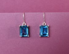 Gemporia - A pair of 9ct gold blue topaz earrings,