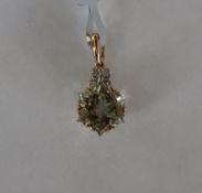 Gemporia - A 9ct gold prasiolite and diamond pendant,