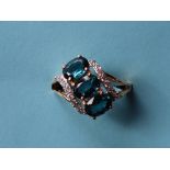 Gemporia - A 9ct gold kyanite and white zircon ring, set with oval kyanite and round white zircons,