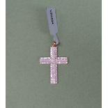 Gemporia - A 9ct gold diamond cross pendant, set with tapered baguette and round cut diamonds,