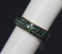 Gemporia - A 9ct gold green diamond ring, set with round cut green diamonds totalling 1ct,