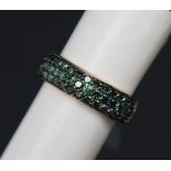 Gemporia - A 9ct gold green diamond ring, set with round cut green diamonds totalling 1ct,