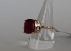 Gemporia - A 9ct gold ruby and white zircon ring,