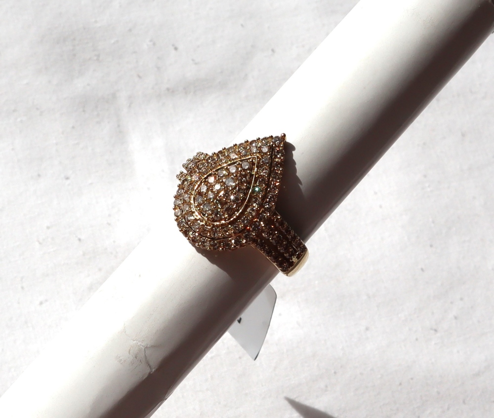Gemporia - A 9ct gold champagne argyle diamond ring, set with round cut diamonds totalling 1.