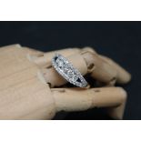 Gemporia - A 9ct gold Tomas Rae diamond ring, set with round cut diamonds totalling 1ct,