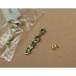 Gemporia - A pair of 9ct gold emerald and diamond earrings,