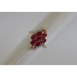 Gemporia - A 9ct ruby and white zircon ring,