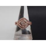 Gemporia - A 9ct rose gold Tomas Rae pink diamond ring, set with round cut diamonds totalling 1ct,