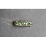 Gemporia - A 9ct gold green diamond ring, set with round cut green diamonds totalling 1ct,