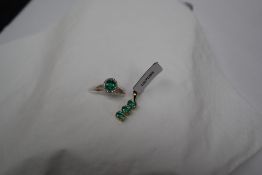 Gemporia - A 9ct gold Tomas Rae emerald and diamond ring,