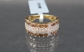 Gemporia - A 9ct gold Tomas Rae diamond ring, set with square and round cut diamonds totalling 1.