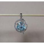 Gemporia - A 9ct white gold blue topaz and diamond pendant,