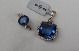 Gemporia - A 9ct gold colour change fluorite, blue topaz and white zircon pendant,