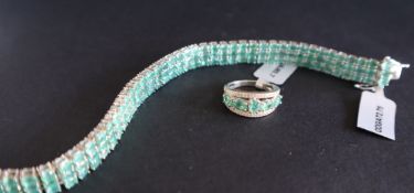 Gemporia - A sterling silver emerald bracelet, set with oval emeralds totalling 19.