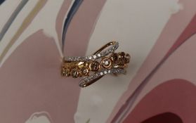 Gemporia - A 9ct gold Tomas Rae diamond ring, set with round cut diamonds totalling 1/2ct,