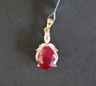 Gemporia - A 9ct gold ruby and white zircon pendant,