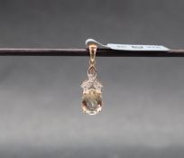 Gemporia - A 9ct gold sunstone and white zircon pendant,