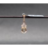 Gemporia - A 9ct gold sunstone and white zircon pendant,