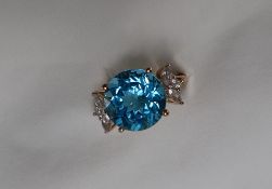 Gemporia - A 9ct gold blue topaz and white zircon ring,
