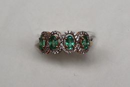 Gemporia - A 9ct gold emerald and white zircon ring,