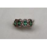 Gemporia - A 9ct gold emerald and white zircon ring,