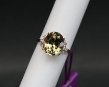 Gemporia - An 18ct gold Lorique csarite and diamond ring,