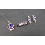 Gemporia - A 9ct gold tanzanite and diamond pendant, set with oval tanzanite and round diamonds,