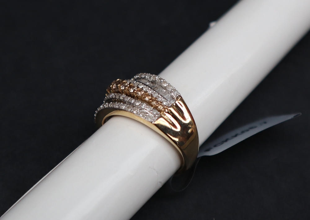 Gemporia - A 9ct gold diamond ring, set with round and tapered baguette cut diamonds totalling 1. - Image 3 of 5