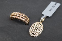 Gemporia - A 9ct gold diamond pendant, set with round cut diamonds totalling 3/4ct,