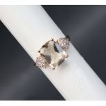 Gemporia - A 9ct gold serenite and white zircon ring,